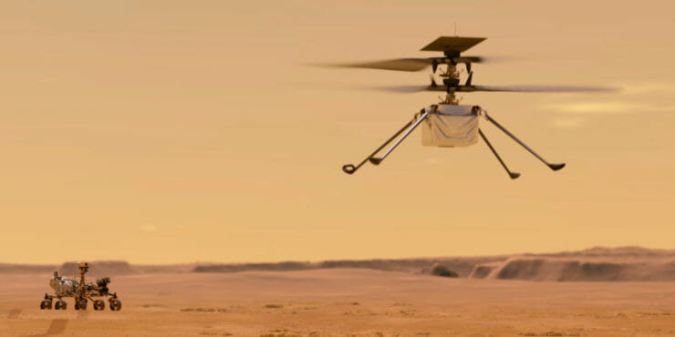 Na ilustračnej snímke amerického Národného úradu pre letectvo a vesmír (NASA) je zobrazený vrtuľník Ingenuity na planéte Mars, v pozadí robotické vozidlo Perseverance.