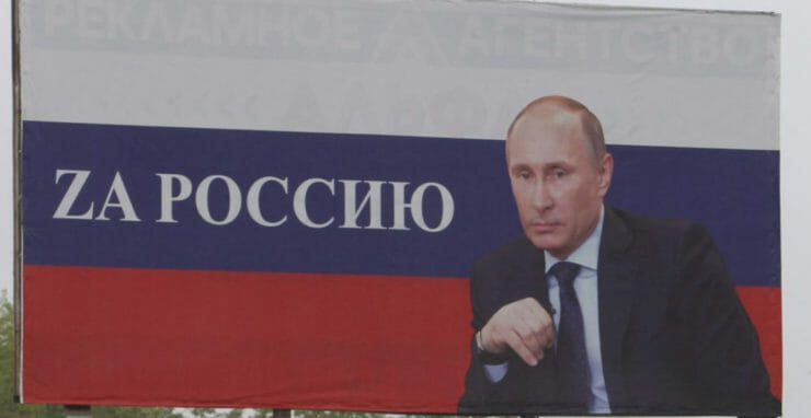 Na ilustračnej snímke billboard s portrétom Vladimira Putina a nápisom Za Rusko v Groznom. Foto: tsasr/ap