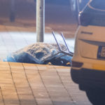 Na snímke prikryté telo po streľbe na Zámockej ulici v Bratislave 12. októbra 2022.